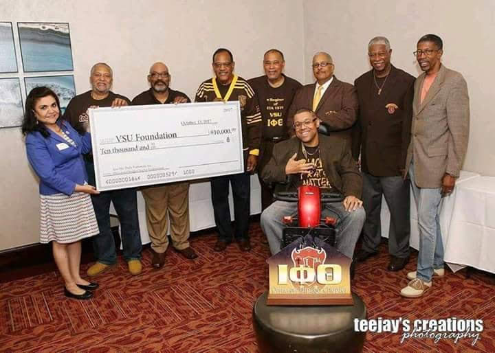 Brothers gathered for a VSU Foundation check presentation.